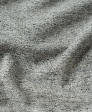 Heather gray sweatshirt fabric close-up with heathered knit texture