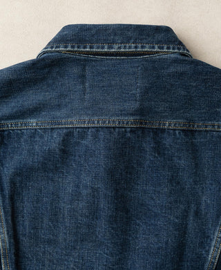 Indigo denim jacket back panel with yoke and shoulder seam stitching