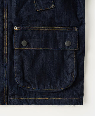 Indigo denim field jacket with flap chest pocket and metal buttons.
