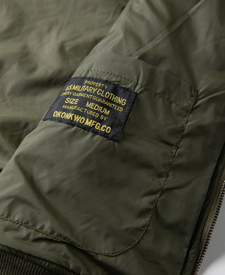 양면 다이아몬드 퀼팅 스탠드 칼라 재킷 - 올리브 