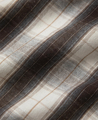 Beige and dark brown plaid shirt fabric with fine vertical and horizontal lines