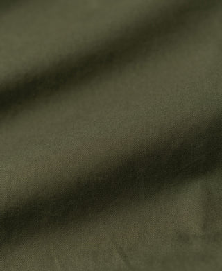 Olive Harrington jacket fabric close-up with fine woven texture