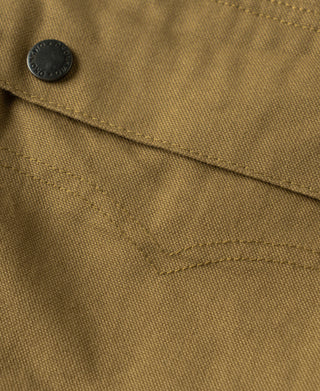 Khaki canvas jacket collar button and stitched placket detail