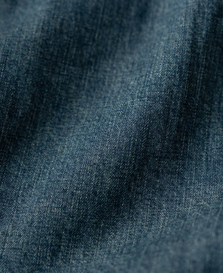Washed denim fabric texture in medium blue