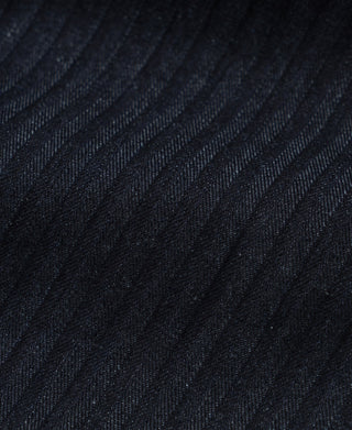 Indigo HBT denim fabric texture with subtle diagonal stripe pattern