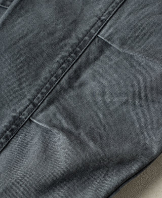 Gray-blue canvas jacket back with diagonal seam and panel stitching