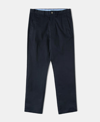 Navy cotton-blend slim tapered trousers with front button and side pockets