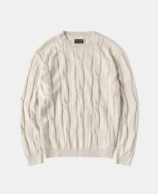 Apricot wool-blend cable knit crewneck sweater with ribbed hem and cuffs