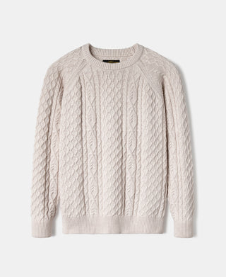 Cream cable knit fisherman sweater with crew neckline and ribbed cuffs