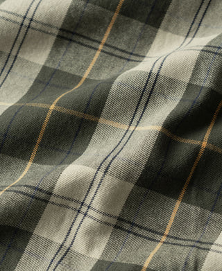 Olive field jacket fabric with cream and navy plaid pattern