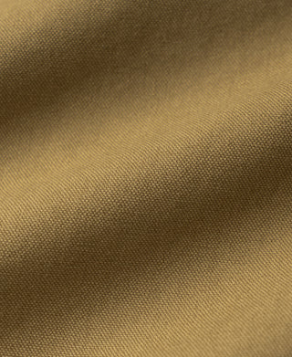 Khaki canvas fabric close-up with textured weave