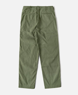 Olive fatigue trousers with relaxed fit, button closure, and side pockets
