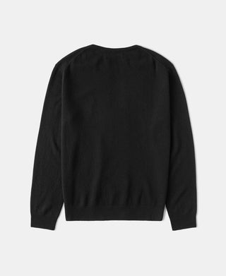 Black crewneck sweater, back view with long sleeves and ribbed cuffs and hem