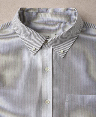 Striped button-down shirt with spread collar and front placket, close-up