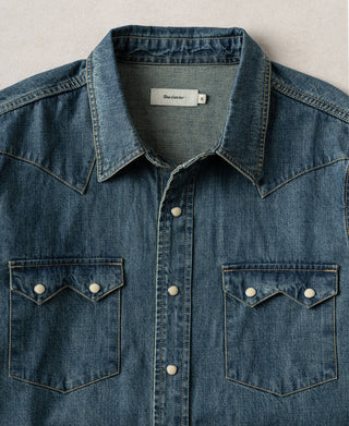 Washed denim western shirt collar with button placket and chest snap pockets