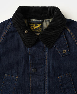 Indigo denim field jacket with black corduroy collar and button chest pocket