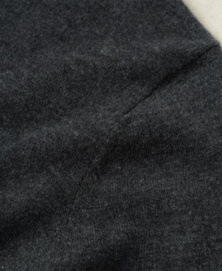 Heather gray sweater knit texture and shoulder seam detail
