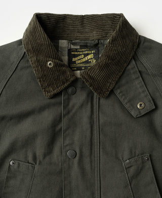 Olive canvas field jacket with corduroy collar and metal button tabs