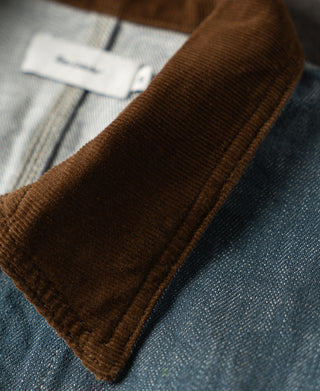 Brown corduroy trim on the jacket cuff