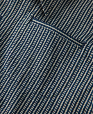 Striped cossack jacket side trim seam with contrast stitch