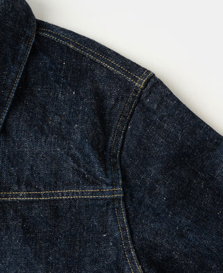 Indigo selvedge denim jacket side seam with contrast yellow top-stitching