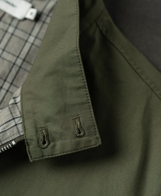 Olive Harrington jacket sleeve cuff with snap closure and small embroidered detail