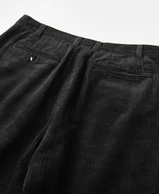 Black corduroy trousers with front pleats and side pocket