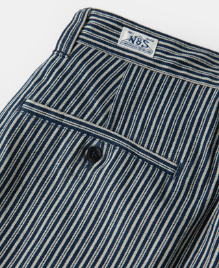 Striped work trousers, dark blue and white waistband with button and brand label