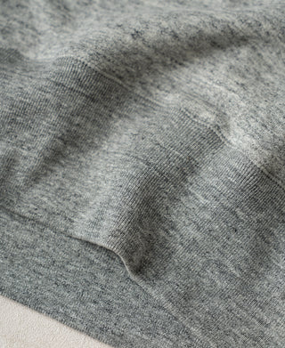 Heather gray ribbed hem with fabric texture and sleeve cuff detail