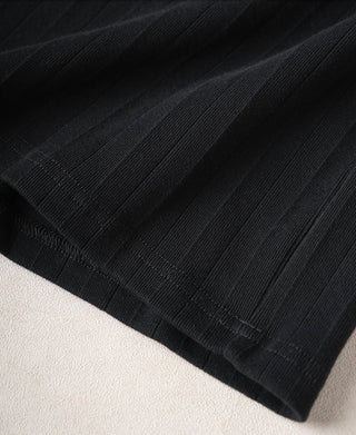 Vintage black ribbed cotton T-shirt cuff/hem edge close-up