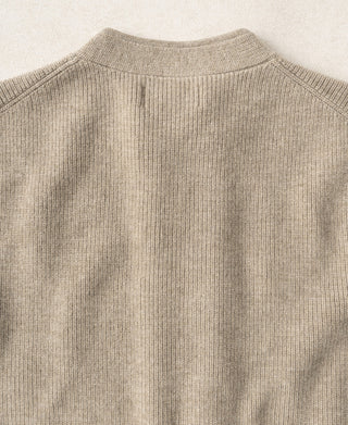 Ecru ribbed knit cardigan with crew collar and double-breasted button front