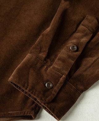 Brown corduroy shirt cuff with two-button closure