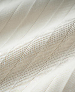 Close-up of oatmeal white ribbed cotton fabric texture on the T-shirt