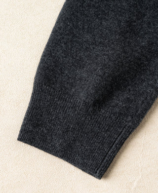 Heather gray merino wool sweater sleeve cuff ribbing and straight hem