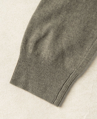 Merino wool crewneck sweater sleeve cuff, grayish green knit with ribbed hem