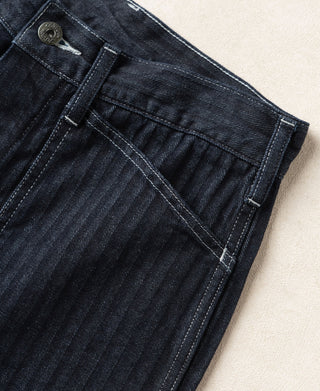 Indigo denim fatigue pants back with waistband placket and top button closure