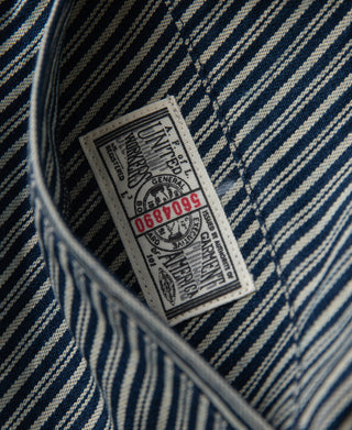 Striped cossack jacket interior with size label stitched on lining