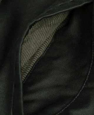 Black olive deck jacket inner pocket opening with stitched edge close-up