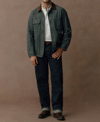 Sage blue denim barn jacket with brown collar, four pockets, and button-front closure