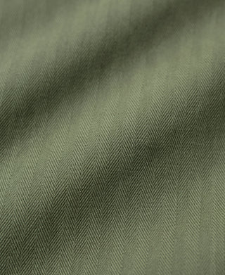 Olive HBT-style fabric with tight herringbone twill texture