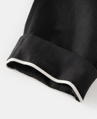 leg opening detail of Textured Linen-Cotton Trousers – Black