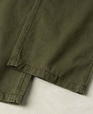 leg opening detail of Vintage Washed Tapered 5-Pocket Pants in Olive