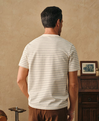 lifestyle shot of Heavyweight Cotton Striped Pocket T-Shirt - Apricot