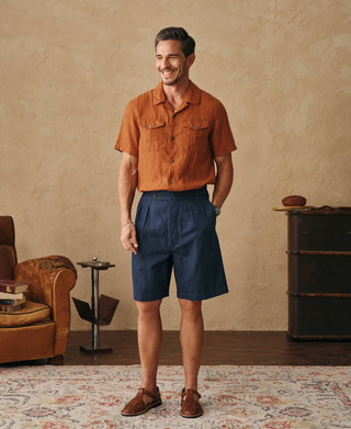 lifestyle shot of Indigo Relaxed Double-Pleated Hemp-Cotton Shorts 