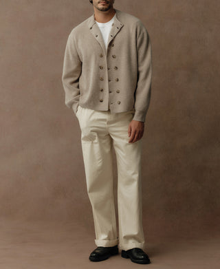 Ecru wool-blend knit cardigan on model with double-breasted button front