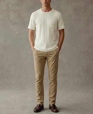 Oatmeal white ribbed cotton pocket T-shirt on model with crew neck and short sleeves