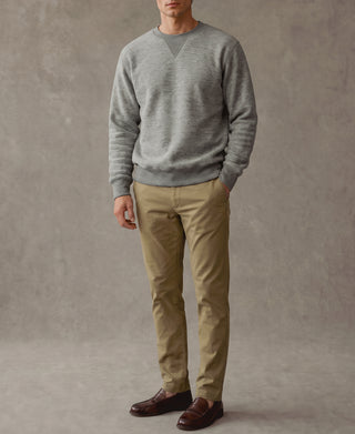 Heather gray crewneck sweatshirt with ribbed hem and cuffs on model