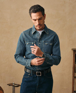 Washed denim western shirt on model, snap chest pockets and button front