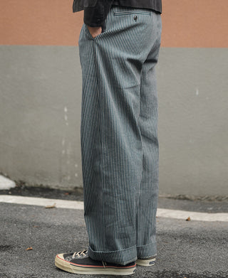 Blue-and-white striped work trousers on model, straight leg with cuffs