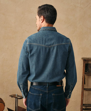 Washed denim western shirt, back view with yoke seam and pointed collar